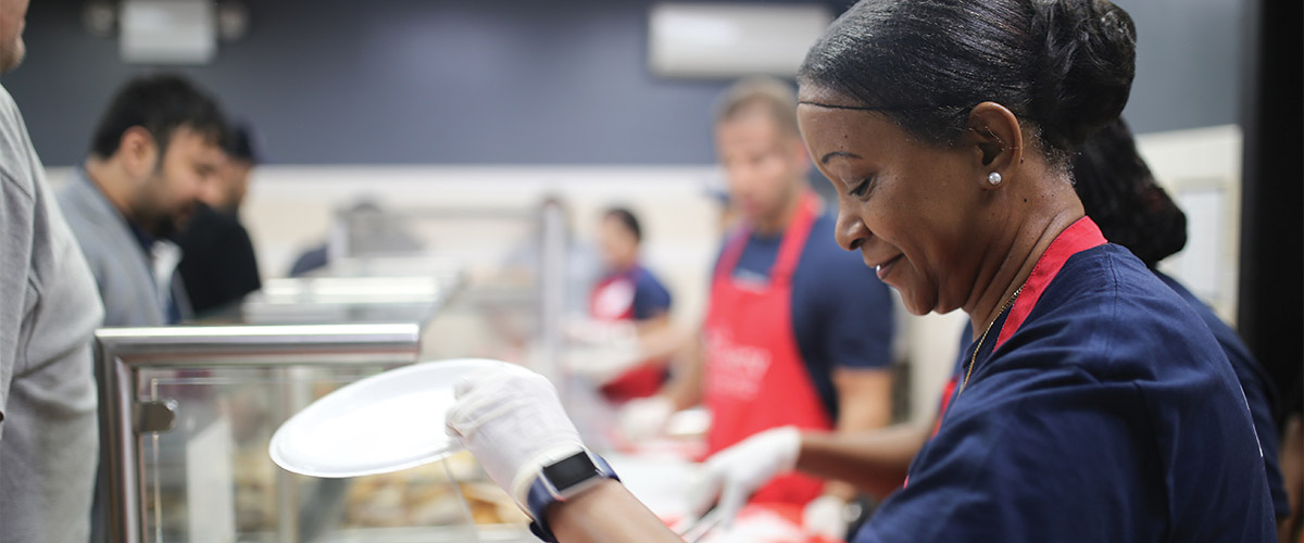 Volunteer serving at The Bowery Mission